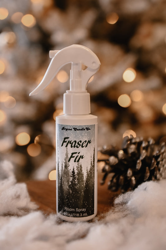 Room spray bottle labeled 'Fraser Fir' with a festive background